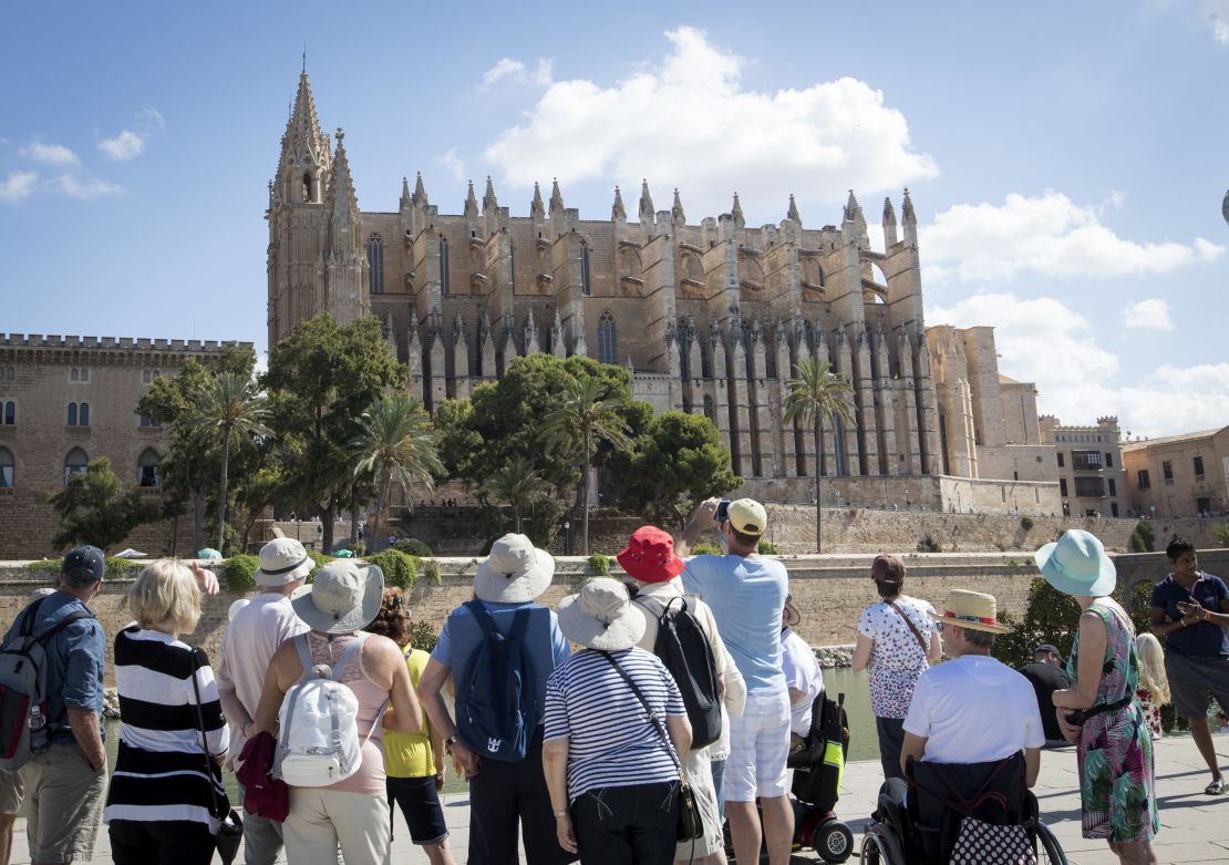 Tourists at the cathedral of Palma de Mallorca in 2017.
