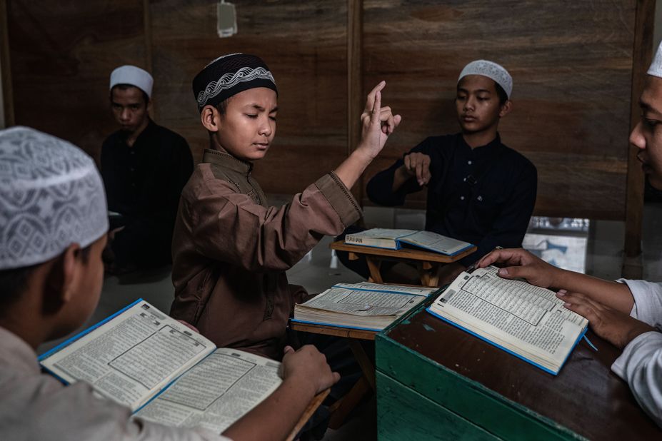 Students in Yogyakarta, Indonesia, read the Quran at the Islamic deaf boarding school Darul Ashom on Thursday, May 14.