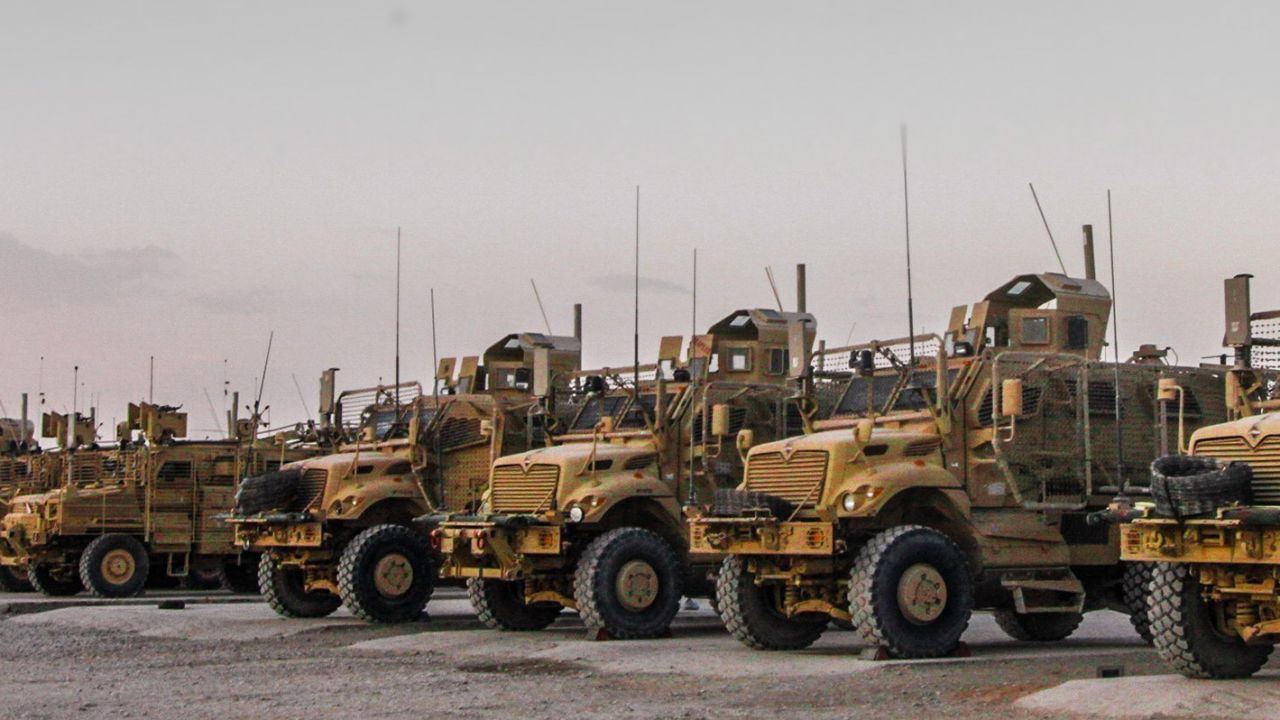 Soldiers assigned to G Company, 2nd Battalion, 14th Infantry Regiment, 10th Mountain Division maintain mine resistant ambush protected vehicles (MRAP) at the maintenance distribution yard on Kandahar Airfield, Afghanistan