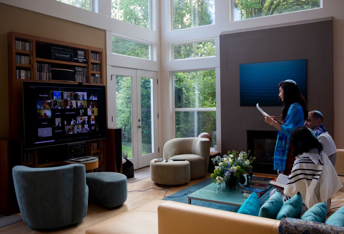 Yvonne Reiter performs a Torah reading over Zoom as she celebrates her bat mitzvah ceremony at home during the coronavirus pandemic. (Lindsey Wasson/Getty Images)