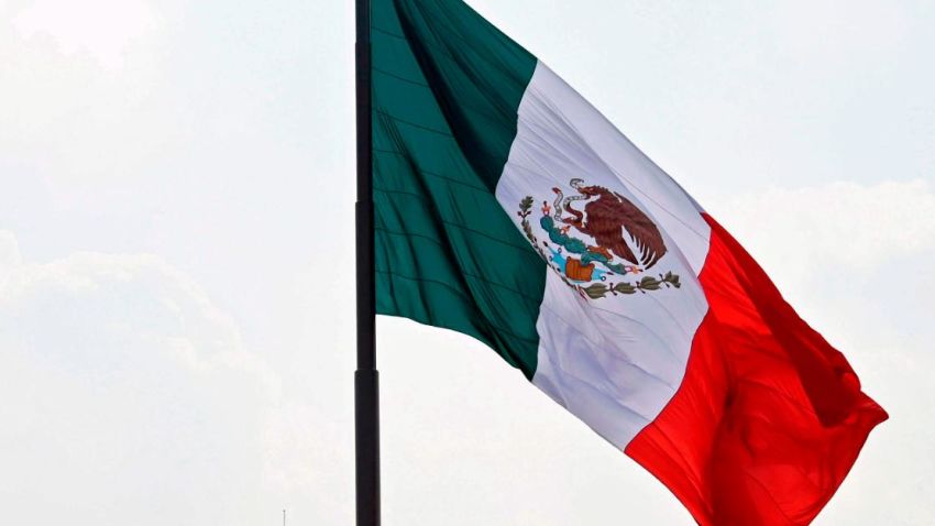 View of a Mexican national flag with the National Palace in the background at the Zocalo square in Mexico City on September 19, 2019, as Mexico marks the anniversaries of two deadly earthquakes that hit the country -one two years ago that claimed 369 lives, and another that killed more than 10,000 people on the same date in 1985. - Two years ago, residents of Mexico City had just finished the earthquake drill they hold every September 19 -- a ritual in memory of 1985 -- when, some two hours later, the ground started shaking violently. (Photo by ALFREDO ESTRELLA / AFP)        (Photo credit should read ALFREDO ESTRELLA/AFP via Getty Images)