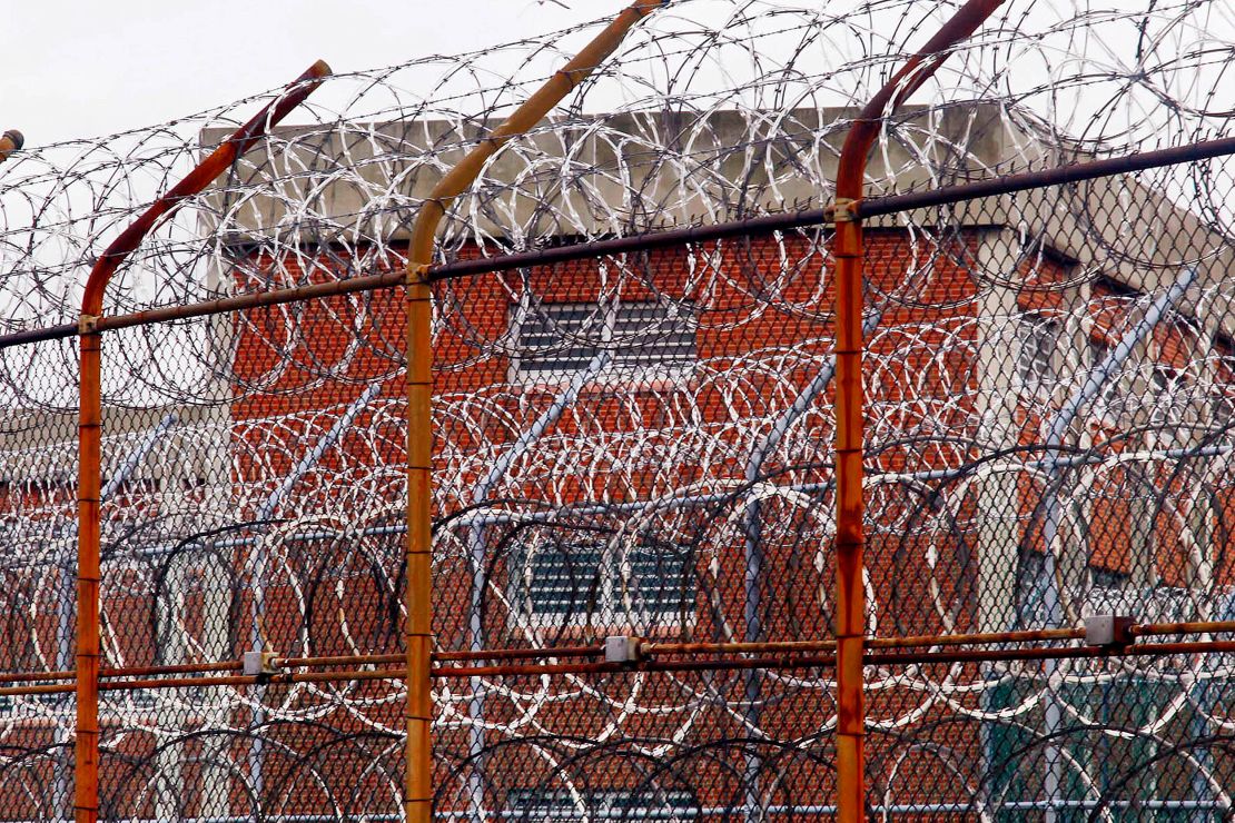 A security fence surrounds inmate housing on the Rikers Island correctional facility in New York in this 2011 photo.