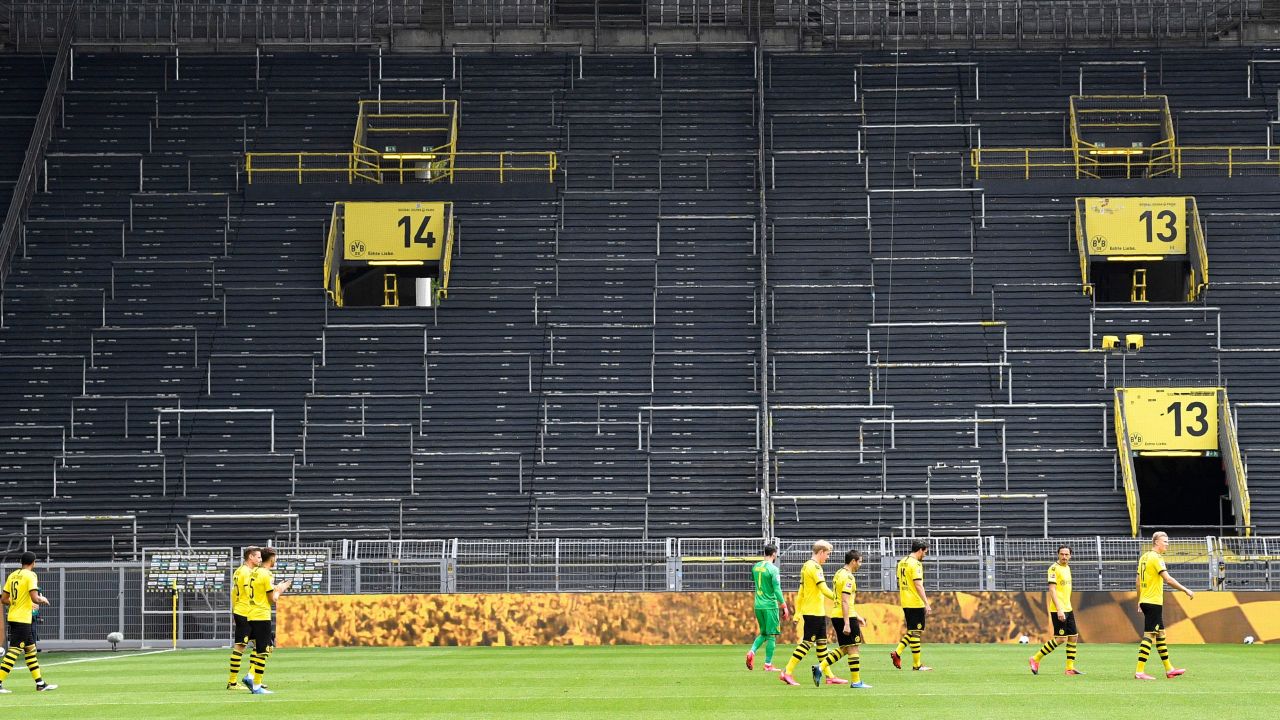 Borussia Dortmund's game against local rival Schalke 04 was played with no fans as soccer returned.