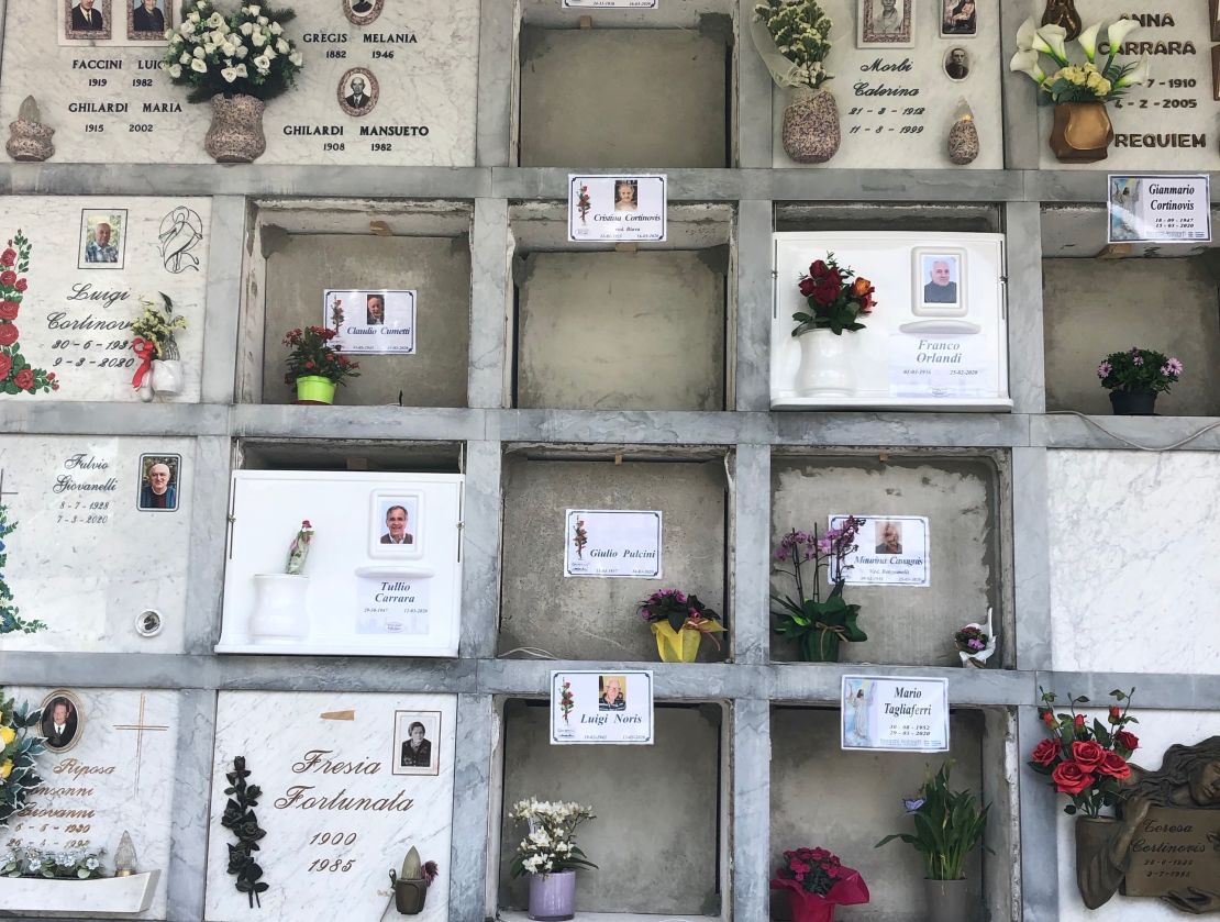 Fresh tombs in Nembro's cemetery. This town suffered one of Italy's highest per capita death tolls as a result of coronavirus. Its undertakers and cemetery workers have been busy.