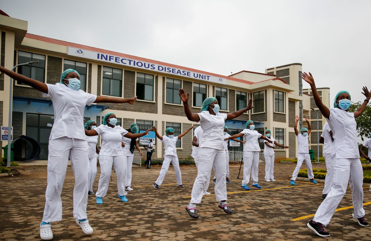 Nurses in Nairobi, Kenya, take part in a Zumba fitness class in the parking lot of the Kenyatta University Teaching, Referral and Research Hospital.