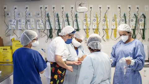 Doctors and nurses work in the Covid-19 intensive care unit at the Emilio Ribas Institute of Infectious Disease hospital in Sao Paulo.