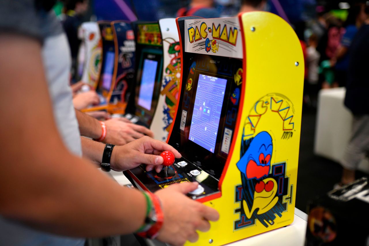 A gamer plays "Pac-Man" at a trade fair in Cologne, Germany in 2019.