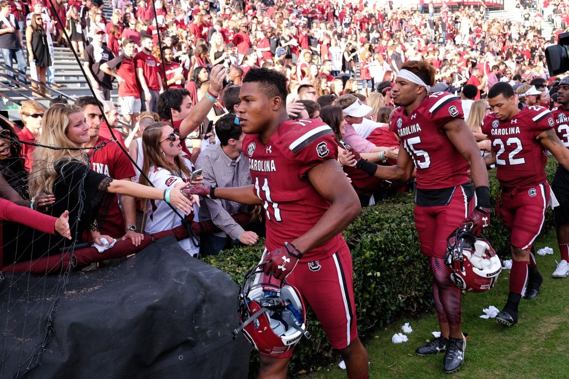 South Carolina Gamecocks players acknowledge fans after the Palmetto Bowl between Clemson and South Carolina at Williams-Brice Stadium in Columbia in 2015.