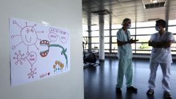 A medical staff speaks with a psychologist in a rest area of the University Hospital of Strasbourg (HUS), on May 6, 2020, in the framework of the Covid-19 epidemic medical-psychological support for health professionals and students, eastern France, as the country is under lockdown to stop the spread of the Covid-19 pandemic caused by the novel coronavirus. Frederick Florin/AFP/Getty Images
