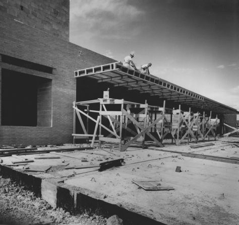 Construction workers build a JCPenney store in Denver in 1956.