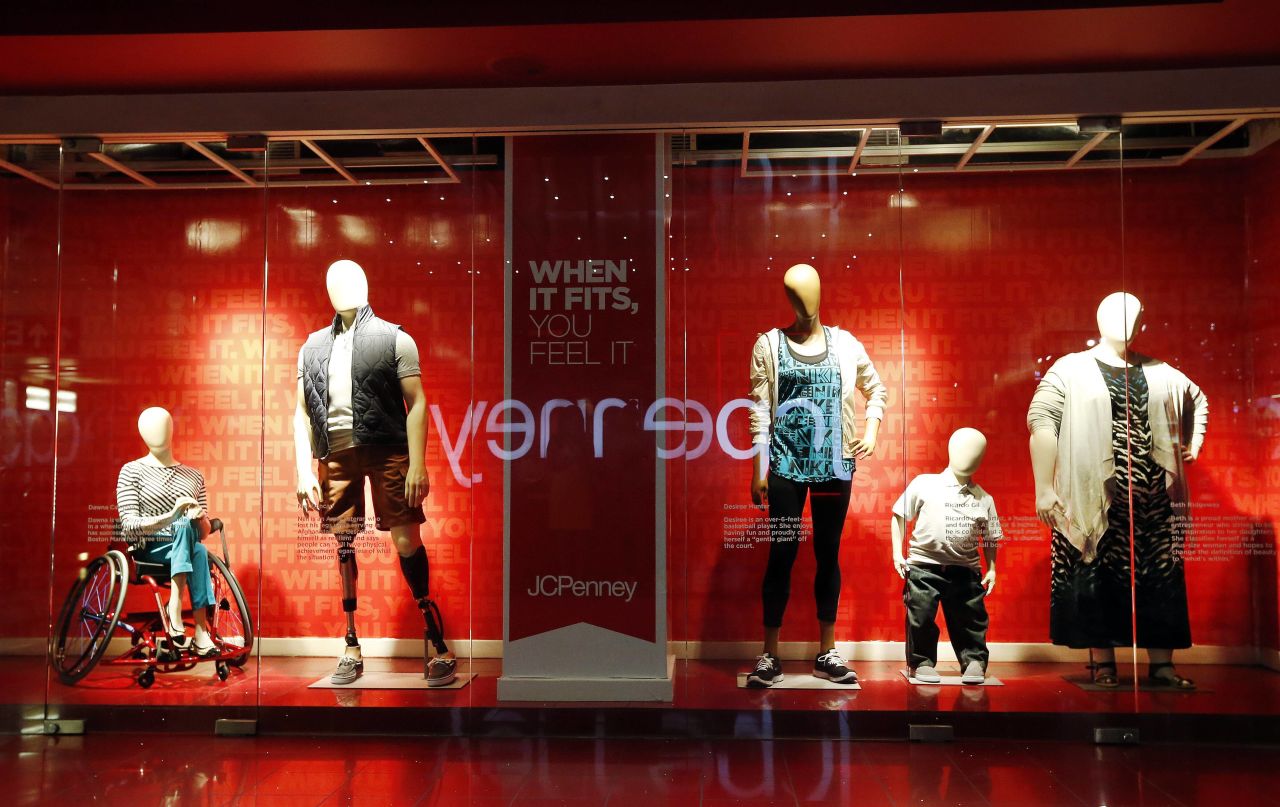 Mannequins of different shapes and sizes are displayed in a store window in New York in 2014.