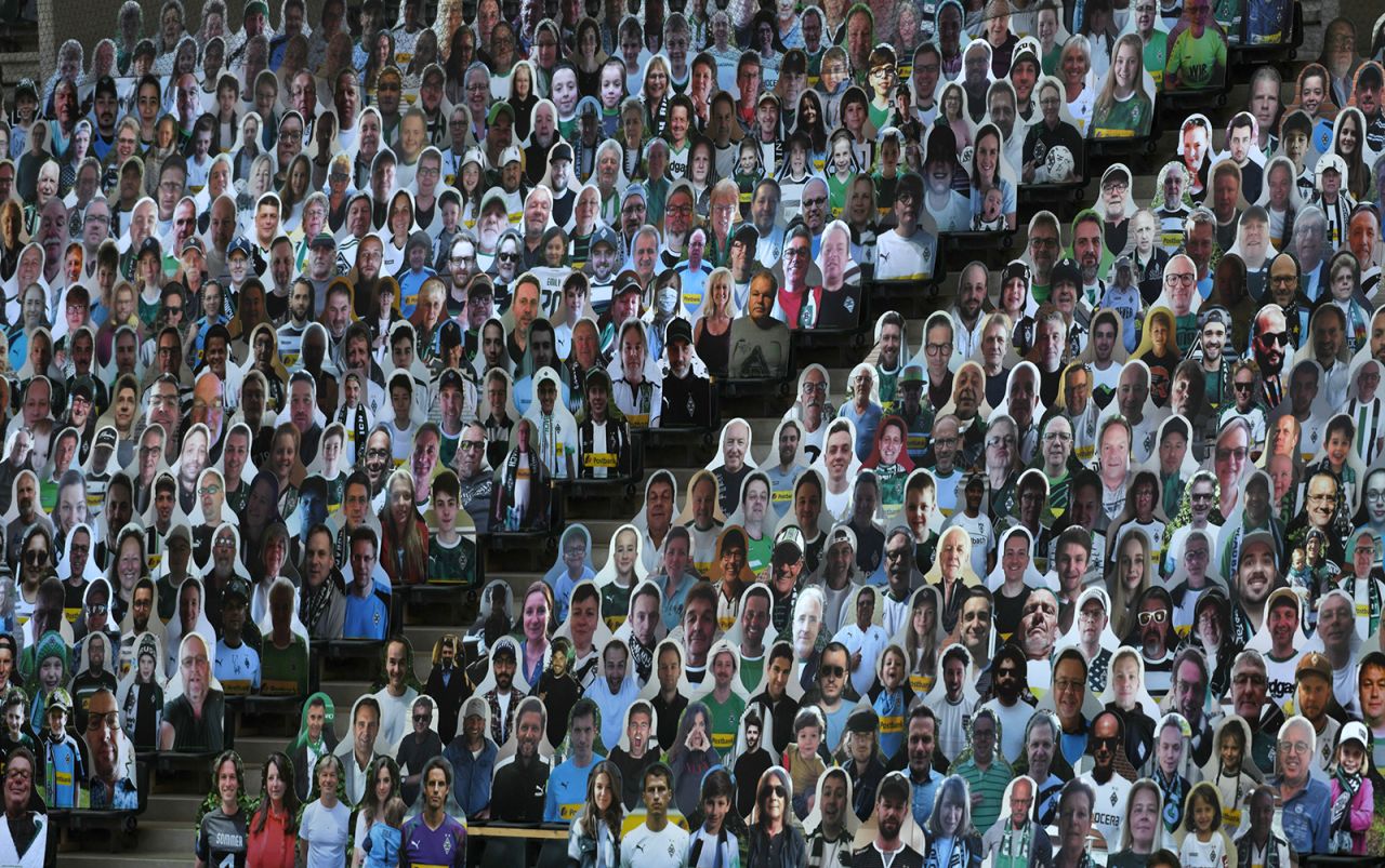 Cardboard cutouts of soccer fans are seen at the Borussia-Park stadium in Mönchengladbach, Germany. The Bundesliga, Germany's top pro soccer league, became <a href="https://www.cnn.com/2020/05/16/sport/germany-bundesliga-return-football-spt-intl/index.html" target="_blank">the first major European competition to return amid the coronavirus pandemic.</a>
