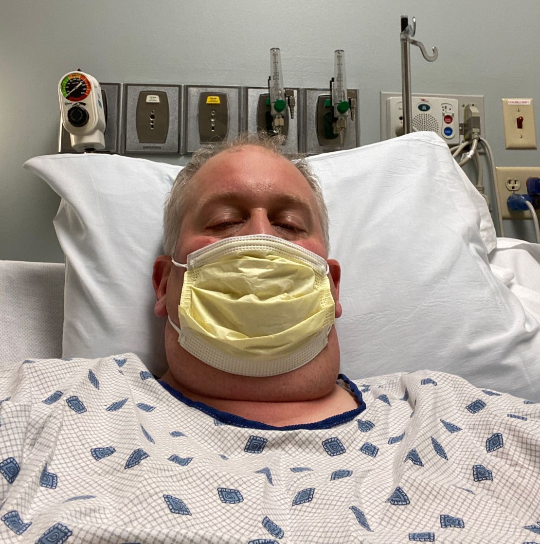 Michael Herbert in a hospital while being treated for coronavirus.