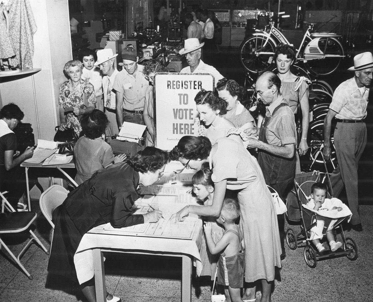 People vote inside a Sears store in Tucson, Arizona, in 1953.