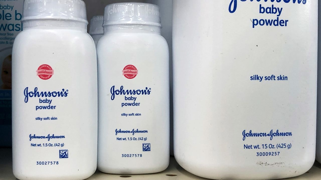 Containers of Johnson's baby powder made by Johnson and Johnson are displayed on a shelf on July 13, 2018 in San Francisco, California. A Missouri jury has ordered pharmaceutical company Johnson and Johnson to pay $4.69 billion in damages to 22 women who claim that they got ovarian cancer from Johnson's baby powder.  (Photo by Justin Sullivan/Getty Images)