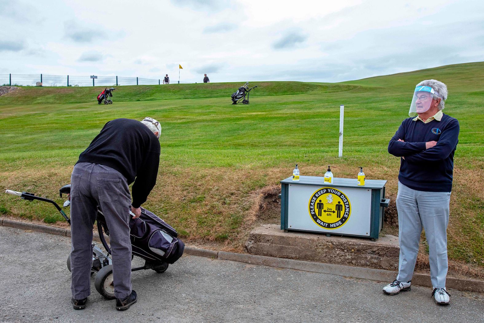 Golfers prepare to play a round at the Howth Golf Club in Dublin, Ireland, on May 18.