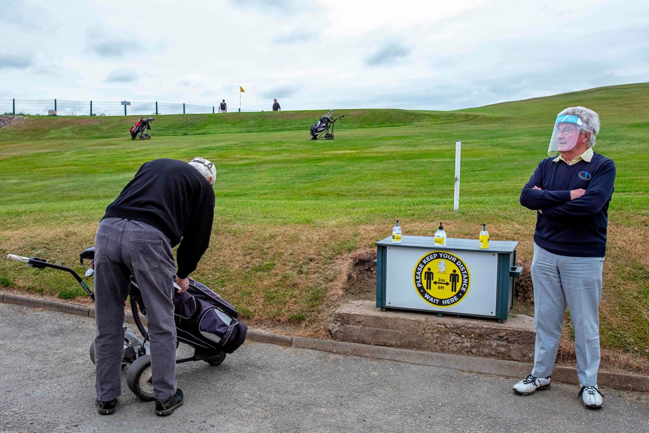 Golfers prepare to play a round at the Howth Golf Club in Dublin, Ireland, on May 18.