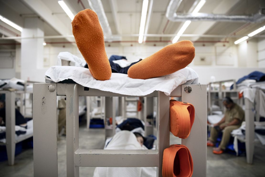 Detainees lay on their bunks in their pod at the Stewart Detention Center in Lumpkin, Georgia, on November 15, 2019.