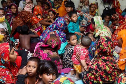 People in Gabura, Bangladesh, gather at a cyclone center for protection before Amphan made landfall on Wednesday, May 20.