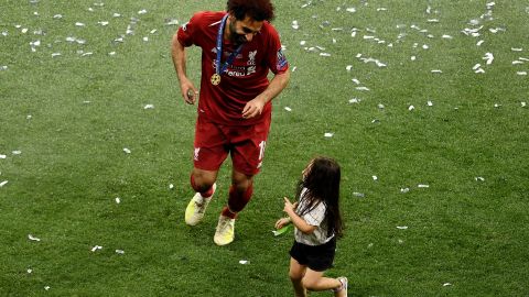 Salah celebrates with his daughter Makka after his side won during the UEFA Champions League Final.