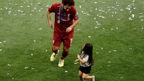 Salah celebrates with his daughter Makka after his side won during the UEFA Champions League Final.