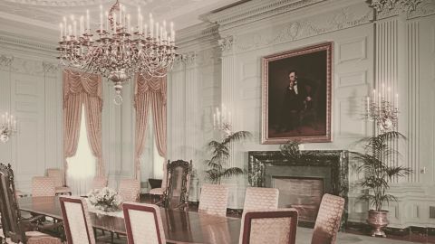 A portrait of former President Abraham Lincoln by George Peter Alexander Healy hangs above the fireplace in the State Dining Room in the White House in 1962. 