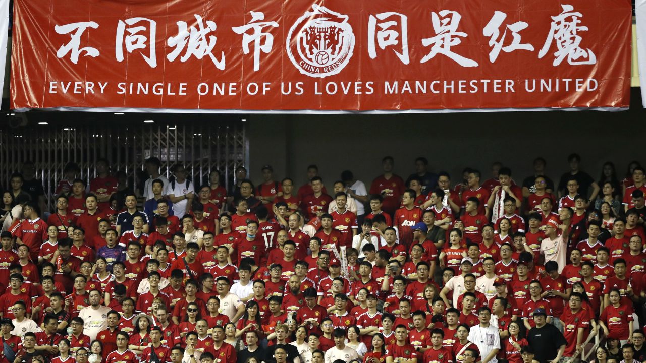 Supporters cheer during the International Champions Cup match between Tottenham and United at the Shanghai Hongkou Stadium in Shanghai, China, last year.