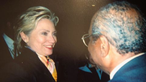 Wilson Roosevelt Jerman talking with then-first lady Hillary Clinton.