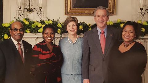 Former White House butler Wilson Roosevelt Jerman with then-President George W. Bush and first lady Laura Bush.