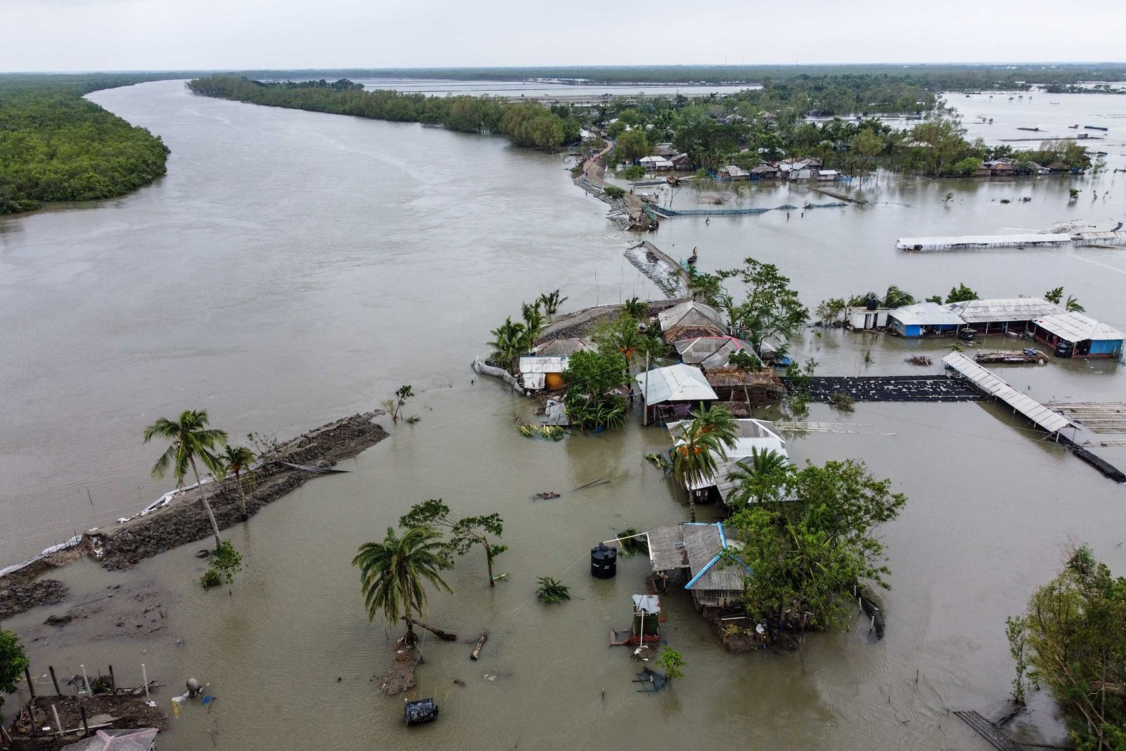 This aerial photo shows flooded buildings after a dam broke in Shyamnagar, Bangladesh.