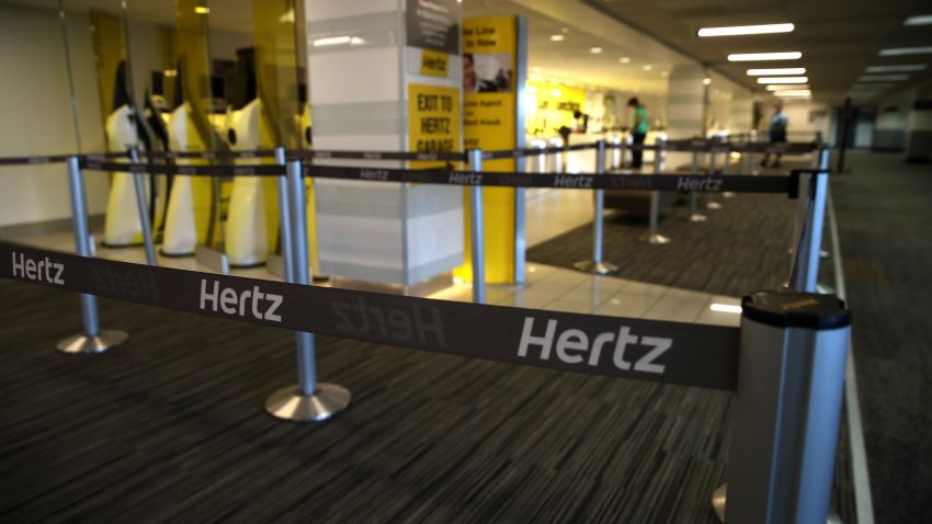 SAN FRANCISCO, CALIFORNIA - APRIL 30: Stanchions with Hertz logo sit in an empty Hertz Rent-A-Car rental office at San Francisco International Airport on April 30, 2020 in San Francisco, California. According to a report in the Wall Street Journal, car rental company Hertz is preparing to file for bankruptcy as the travel industry has come to a standstill due to the coronavirus (COVID-19) pandemic. (Photo by Justin Sullivan/Getty Images)