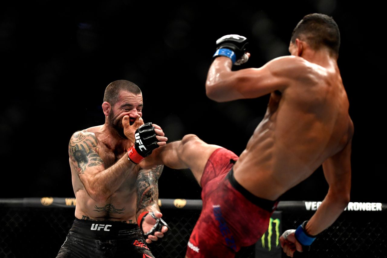 Miguel Baeza kicks Matt Brown during their UFC bout in Jacksonville, Florida, on Saturday, May 16. Baeza stopped Brown in the second round.