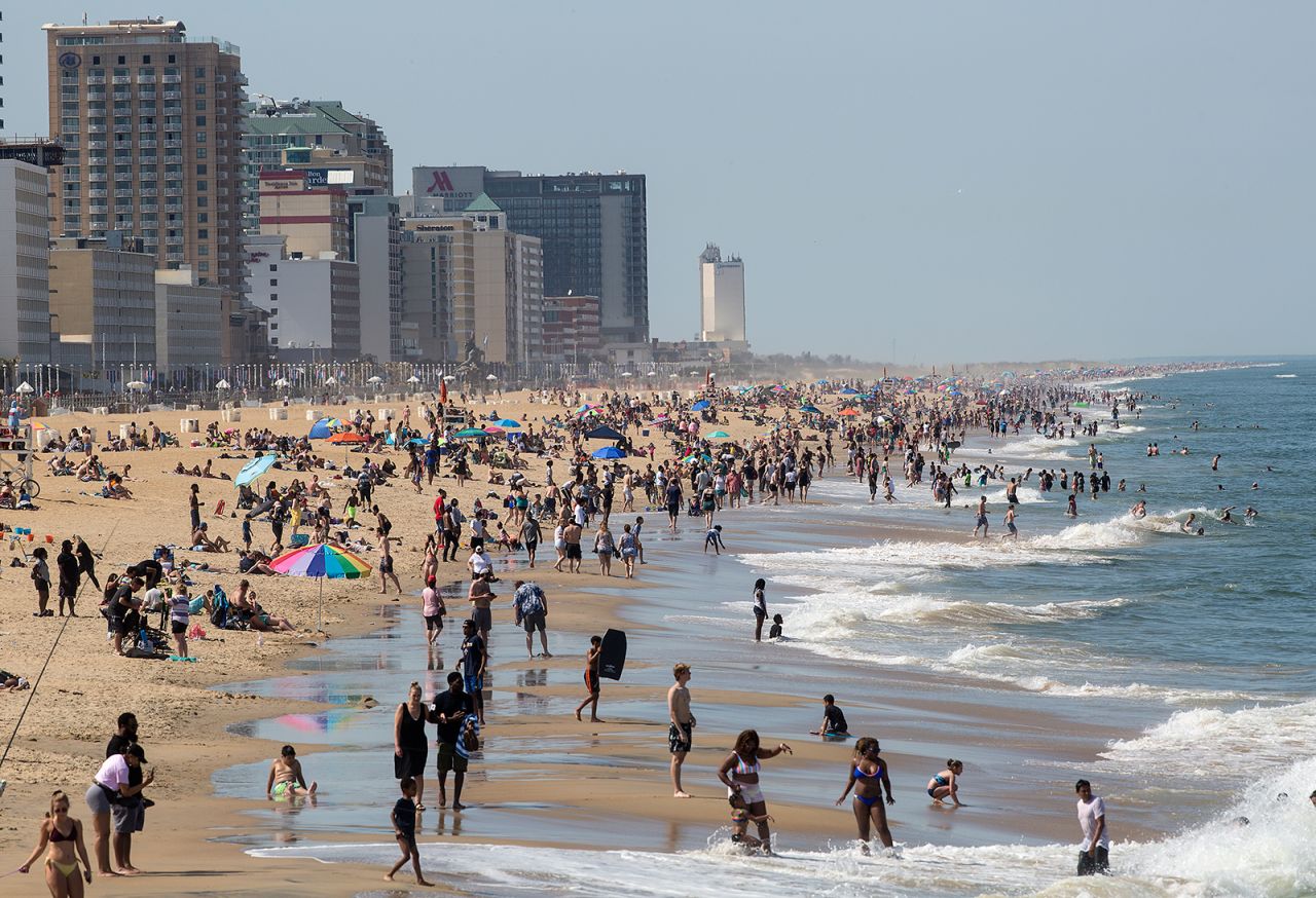 People flock to the oceanfront in Virginia Beach, Virginia, on Saturday, May 16. Many beaches in the United States <a href="https://www.cnn.com/2020/04/24/world/gallery/coronavirus-after-lockdown/index.html" target="_blank">have started to reopen,</a> albeit with social-distancing restrictions.
