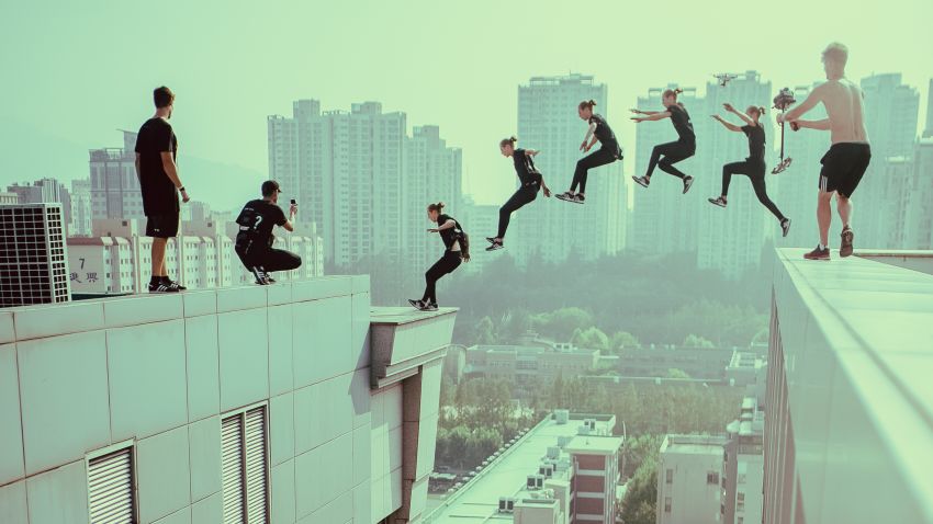 Members of Storror participate in a high-rise jump.