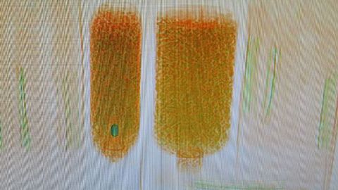 The package being scanned showing the bottles.