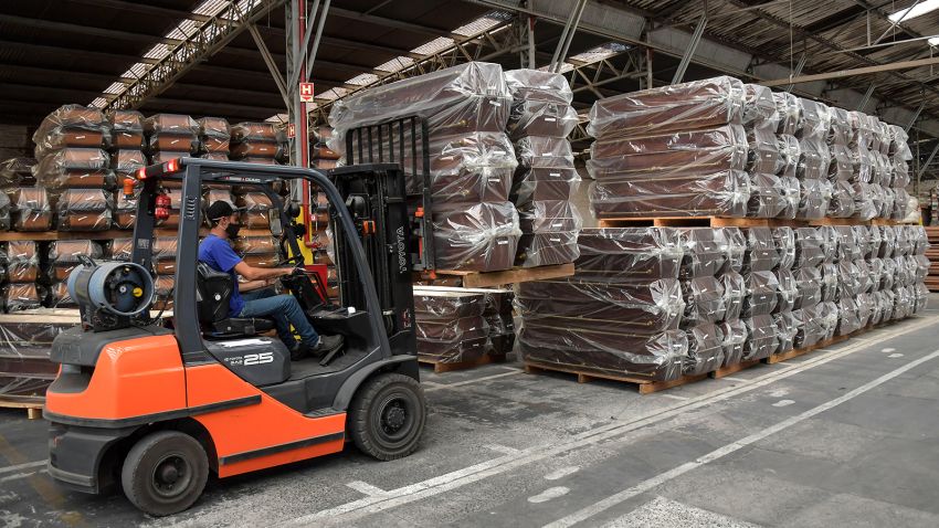 An employee works in the manufacturing of coffins at the Bignotto Funerary Urns Factory, in Cordeiropolis, Sao Paulo state, Brazil, on May 19, 2020, amid the new coronavirus pandemic. - Brazil has seen a record number of coronavirus deaths as the pandemic that has swept across the world begins to hit Latin America with its full force. (Photo by NELSON ALMEIDA / AFP) (Photo by NELSON ALMEIDA/AFP via Getty Images)