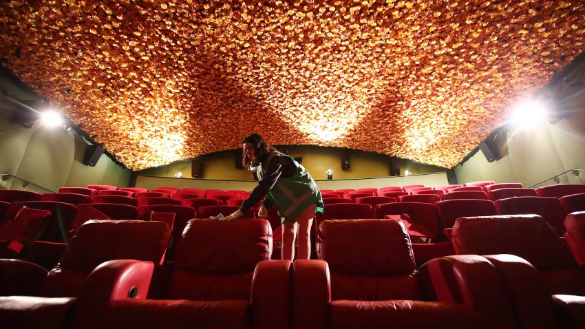 AUCKLAND, NEW ZEALAND - MAY 22:   Jasmine Donaldson cleans and prepares the Paradiso cinema at Matakana Cinemas on May 22, 2020 in Auckland, New Zealand.  Matakana Cinema will re-open on May 28 with the three cinemas operating at a reduced capacity in Covid-19 level two to allow for social distancing between seats and in the foyer. Matakana Cinema has updated their online booking system to include contact tracing, automatic seat spacing between groups and a more contactless option for patrons during their cinema experience. The easing of COVID-19 Alert Level 2 restrictions on business, gatherings and travel were eased in three stages across New Zealand starting from 14 May 2020. Restaurants, cinemas, retail, playgrounds and gyms are now able to open with physical distancing and strict hygiene measures in place while gatherings are limited to 10 people. Domestic travel has resumed and schools and early childhood centres are also open again. New Zealand was placed under full lockdown on March 26 in response to the coronavirus (COVID-19) pandemic. (Photo by Fiona Goodall/Getty Images) *** BESTPIX ***