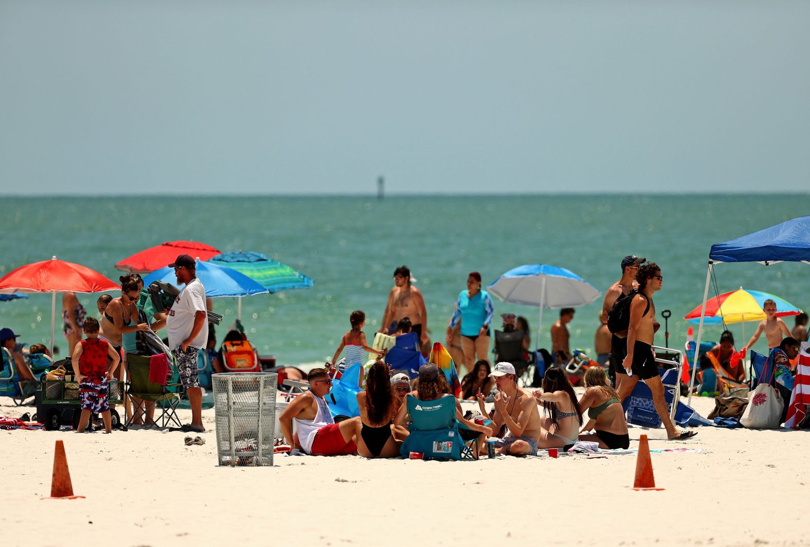 People visit Florida's Clearwater Beach on May 20. Florida opened its beaches as part of Phase One of its reopening.