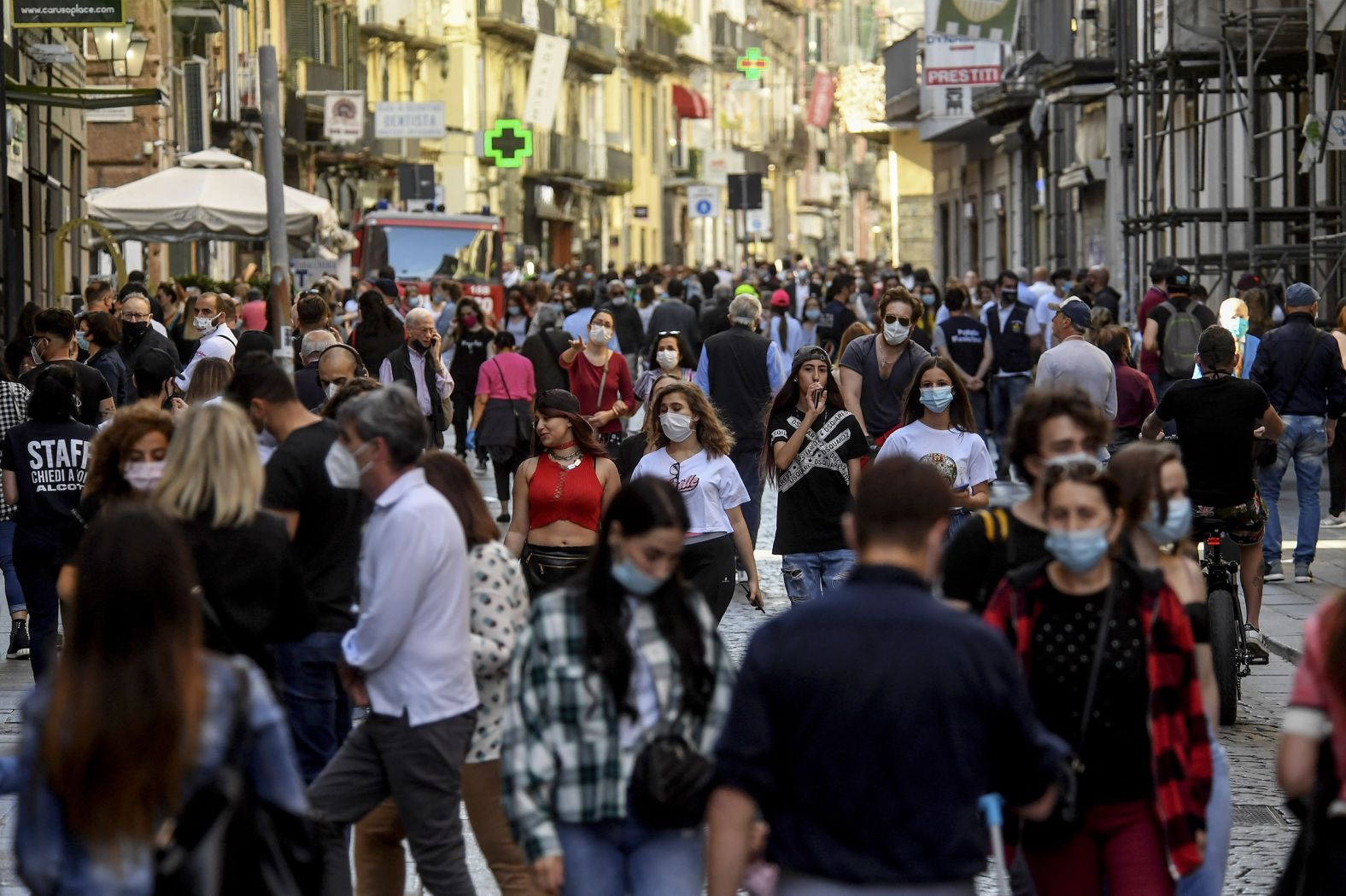 People walk in Naples, Italy, on May 19.