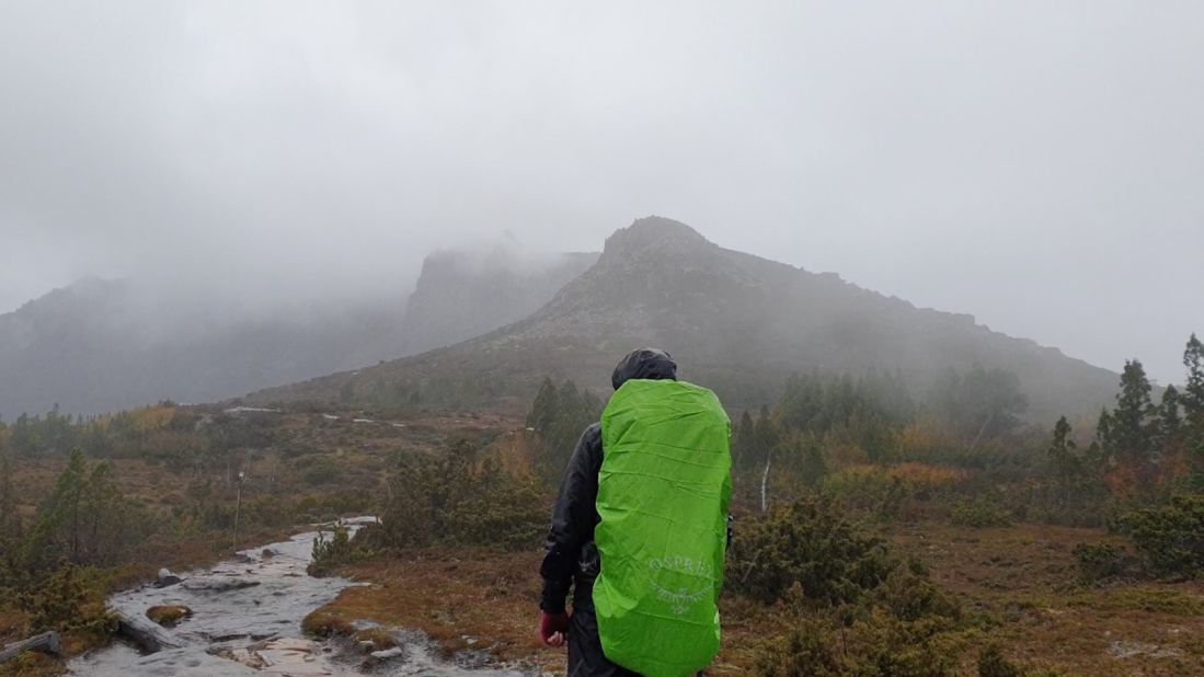 <strong>A grueling journey: </strong>The rain comes down on The Overland Track seed collectors. 