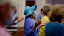 Parishioners wear face masks as they attend an in-person Mass at Christ the King Catholic Church in San Antonio, Tuesday, May 19, 2020. San Antonio parishes that have been closed due to the COVID-19 pandemic have began opening their doors to in-person services. (AP Photo/Eric Gay)