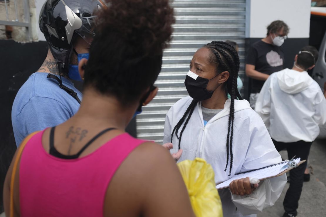 "Cases can be tough," says Renata Alves, a volunteer health worker with the G10 Favela aid group.