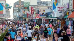 FILE PHOTO: With the relaxing of the coronavirus disease (COVID-19) restrictions, visitors crowd the boardwalk on Memorial Day weekend in Ocean City, Maryland, U.S., May 23, 2020. REUTERS/Kevin Lamarque/File Photo