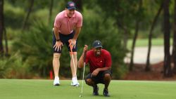 HOBE SOUND, FLORIDA - MAY 24: Tiger Woods and former NFL player Peyton Manning read a putt on the sixth green during The Match: Champions For Charity at Medalist Golf Club on May 24, 2020 in Hobe Sound, Florida. (Photo by Mike Ehrmann/Getty Images for The Match)