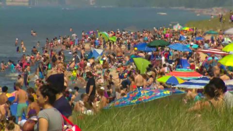 Beachgoers swarmed Indiana Dunes National Park in Porter Sunday.