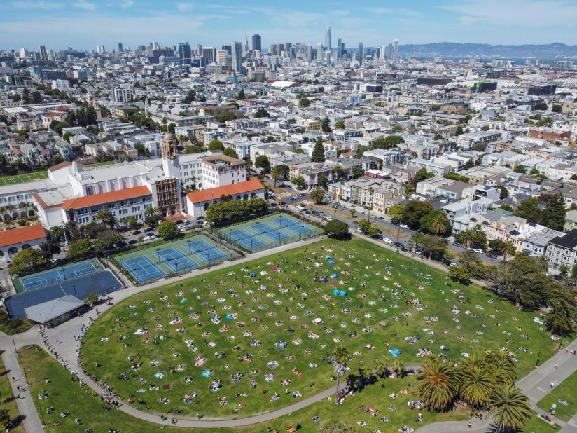 People visit Dolores Park in San Francisco on Sunday.