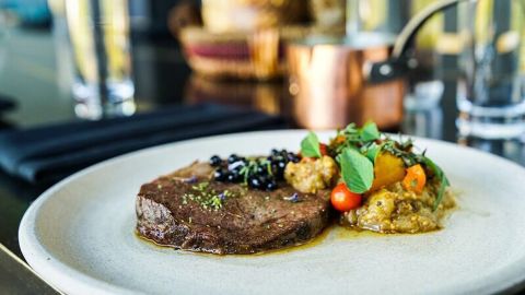 Inspiration for the home cook: Slow cooked leg of lamb with smoked eggplant, tomato, garden huckleberry jus, herbs de Provence salad.