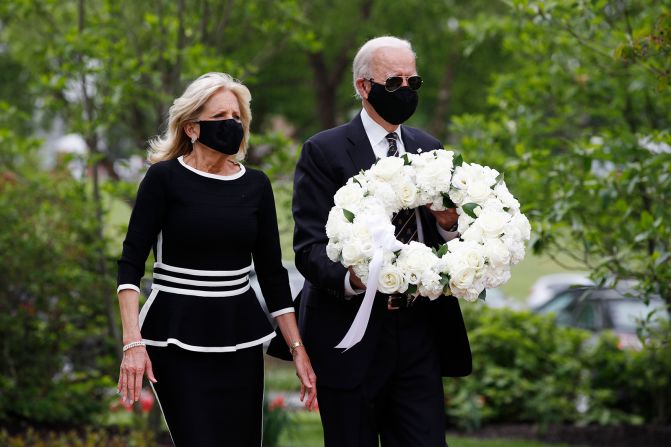 On Memorial Day, the Bidens lay a wreath at the Veterans Memorial Park in New Castle, Delaware. <a href="index.php?page=&url=https%3A%2F%2Fwww.cnn.com%2F2020%2F05%2F26%2Fpolitics%2Fjoe-biden-cnn-interview-trump-face-masks%2Findex.html" target="_blank">In a CNN interview</a>, Biden called President Donald Trump "an absolute fool" for sharing a tweet that mocked him for wearing a mask.
