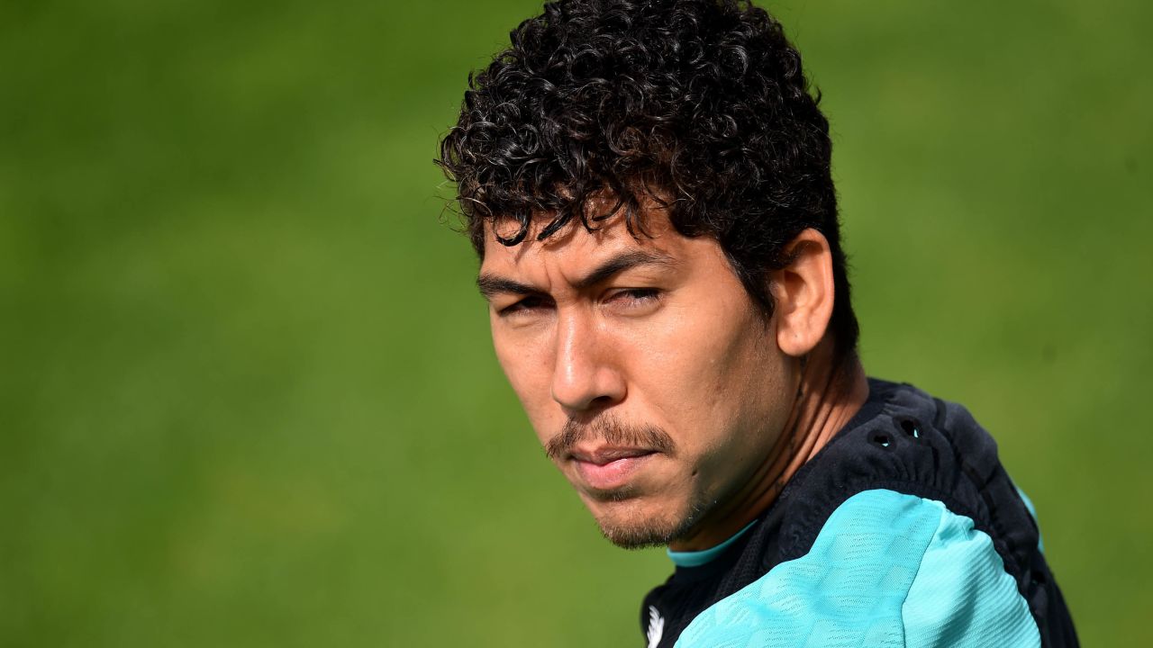 Roberto Firmino's curls rival that of teammate Mo Salah.