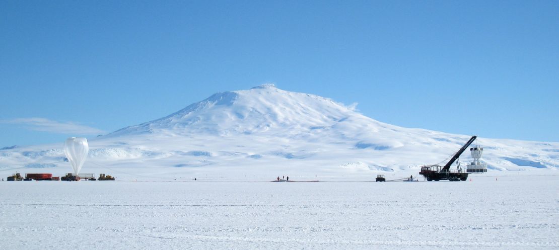 The balloon carries the ANITA experiment up to the stratosphere over Antarctica, which is 6.2 miles above the Earth's surface.